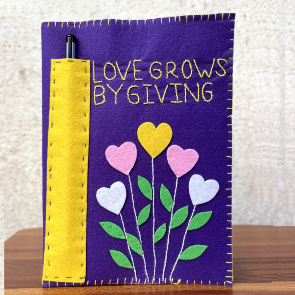 Purple_Love grows by giving_felt bookcover_Dream_Imagine_Create