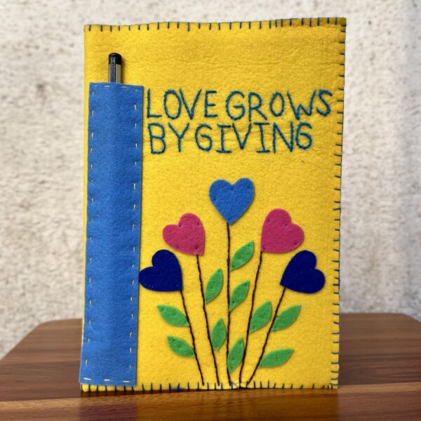 Yellow_Love grows by giving_felt bookcover_Dream_Imagine_Create