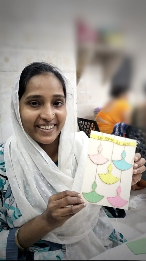 Artisan holding a handmade greeting card